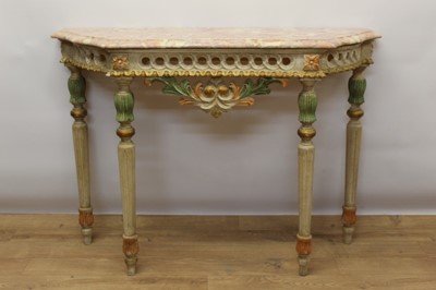 Lot 1443 - Continental marble topped pier table, trapezium shaped variegated marble on polychrome painted pierced frieze and fluted reeded supports, 101cm wide x 33cm deep x 74cm high