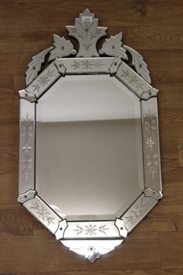 Lot 1445 - 19th century style Venetian etched glass wall mirror, with canted rectangular bevelled plate in etched peripheral plates with shaped cresting, 91 x 51cm