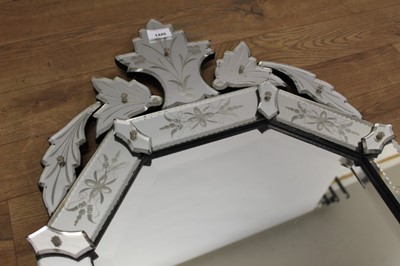 Lot 1445 - 19th century style Venetian etched glass wall mirror, with canted rectangular bevelled plate in etched peripheral plates with shaped cresting, 91 x 51cm