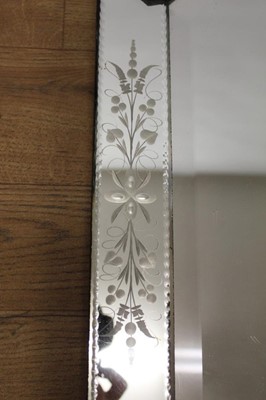 Lot 1445 - 19th century style Venetian etched glass wall mirror, with canted rectangular bevelled plate in etched peripheral plates with shaped cresting, 91 x 51cm