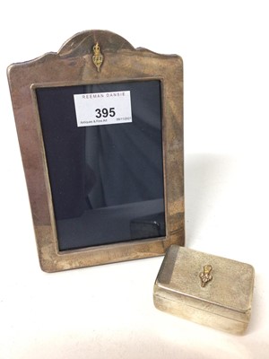 Lot 395 - Silver photograph frame and trinket box with gilt interior, with matching crests, hallmarked 1991, the frame measuring 17cm high in total