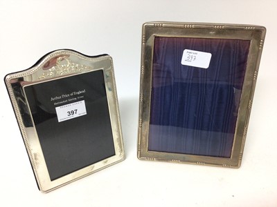 Lot 397 - Two silver photograph frames, one by Arthur Price and hallmarked London 2000, the other London 1990, 19cm x 13cm and 21.5cm x 16.5cm