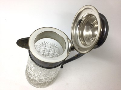 Lot 229 - Good quality cut glass and silver-plated lemonade jug with scrolled handle, 29cm high