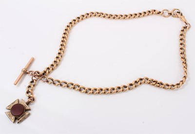 Lot 614 - Edwardian 9ct rose gold watch chain with curb links and locket fob, approximately 54cm length.