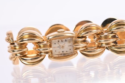 Lot 634 - Art Deco ladies Omega 18ct gold bracelet watch with Omega 15 jewel movement numbered 10483201, the rectangular dial with gold dot and dart hour markers, in gold case on gold bracelet, approximately...