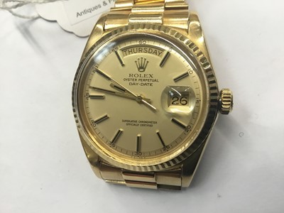 Lot 636 - Gentlemen's Rolex 18ct gold Oyster Perpetual Day Date wristwatch with circular gold dial, applied baton hour markers in Oyster case on 18ct yellow gold Jubilee bracelet with deployment clasp. Seria...