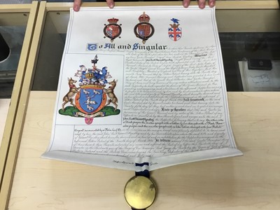 Lot 93 - H.M King George VI, Grant of Arms illuminated scroll appointing new arms to John Scott Hindley, Viscount Hyndley of Meads dated 1948 with Garter King of Arms seal in red box with crowned GR VI ciph...
