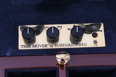 Lot 642 - Buben & Zōrweg 'Time Mover' watch winder, the electrically operated luxury watch winder designed to accommodate six wristwatches, in a glazed burr walnut effect cabinet with fitted drawer below. Ap...