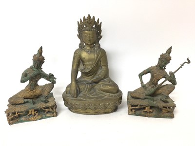 Lot 939 - Chinese bronze buddha, together with two Thai gilt buddhas (3)