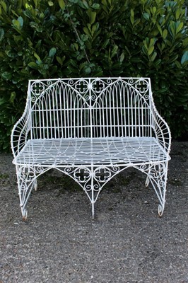 Lot 1488 - Gothic wirework garden bench, square lattice form, 97cm wide