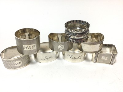 Lot 426 - Pair of Contemporary silver napkin rings of oval form in fitted case (Sheffield 1997), maker Carrs, together with eight other silver napkin rings (various dates and makers) all at approximately 9oz