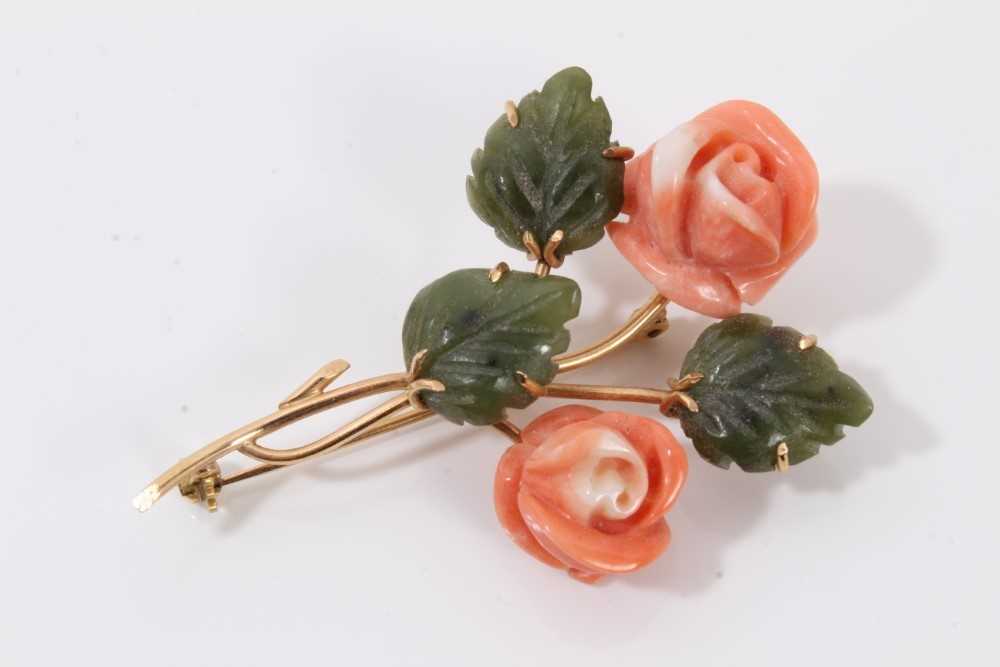 Lot 183 - 18ct gold coral and green hard stone floral spray brooch