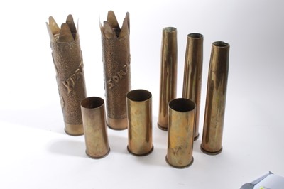 Lot 841 - Pair of First World War brass Trench Art vases named Ypres and Somme, together with six other undecorated brass shell cases (8)