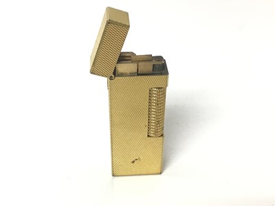 Lot 94 - Dunhill gold plated lighter with engine turned case