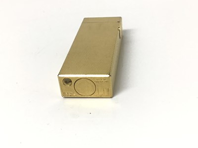 Lot 94 - Dunhill gold plated lighter with engine turned case