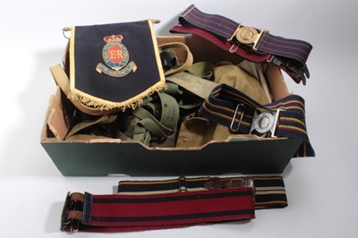 Lot 860 - Collection of mixed militaria to include Second World War gas mask in case, canvas webbing belts, and other belt / accessories (1 box)