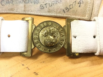 Lot 864 - Second World War canvas webbing belt with waterbottle and various pouches, together with a Sam Browne belt, Grenadier Guards brass belt buckle on white belt, other military belts