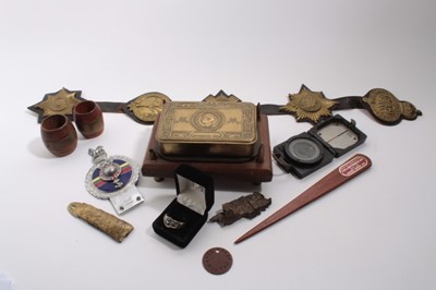 Lot 874 - First World War Princess Mary Gift tin, mounted on a wooden base, together with a Second World War Magnetic Marching Compass Mark I, Royal Marines car grill badge and other militaria (1 box)