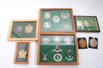 Lot 888 - Five frames mounted with a selection of Scottish Regimental cap badges (some reproductions noted)