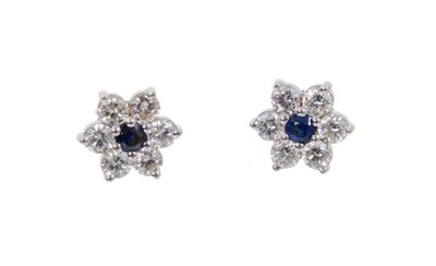 Lot 685 - Pair of diamond and sapphire earrings