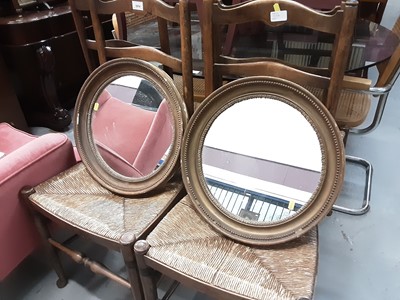 Lot 1075 - Pair of late 19th century gilt framed circular wall mirrors