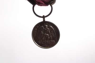 Lot 904 - Fine and fascinating Waterloo Medal 1815, Officially impressed - T. PATERSON, 91st REGT FOOT., with original steel ring suspension and original ribbon (minor edge knocks and scratches, otherwise ve...