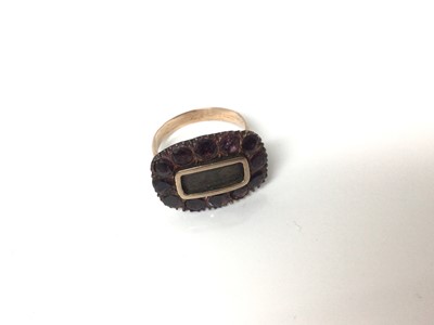 Lot 88 - Georgian garnet mourning brooch converted to a ring