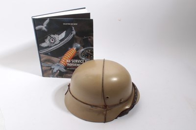 Lot 919 - Second World War Nazi German M35 steel helmet field-painted in Mediterranean, Normandy or Eastern Front Ordnunz Galb camouflage paint. Complete with wire cage, liner and chinstrap. Liner large size...