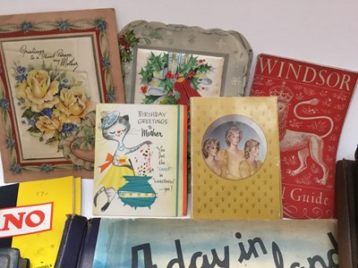 Lot 1448 - One box of mixed ephemera to include albums of photographs of auction posters, James Bond book and other items