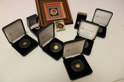 Lot 421 - World - Mixed coins to include G.B. Gold Quarter Sovereign 2009 set in yellow metal ring, Tristan Da Cunha 9ct Gold coins x 5 (N.B. each weighing 1gm), An enamelled Victoria Half-Farthing 1844 set...