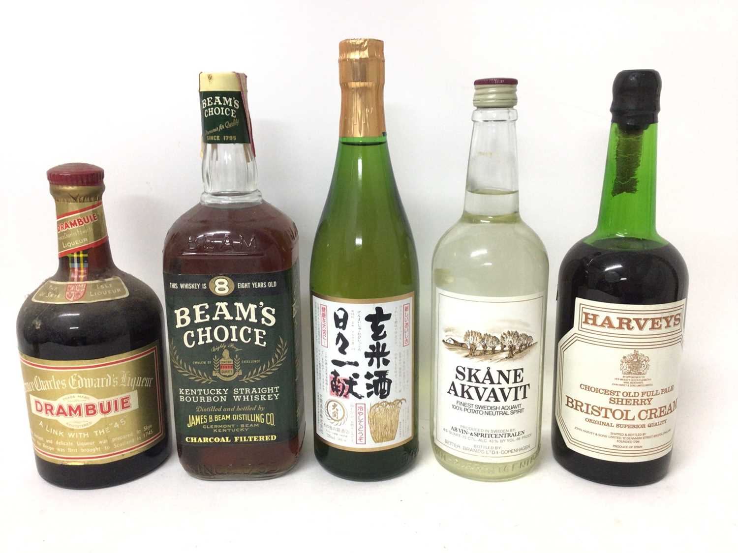 Lot 33 - Five bottle of spirits, including Akvavit, Sake, Bourbon, Bristol Cream and Drambuie