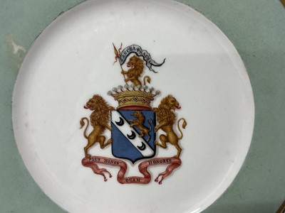 Lot 66 - Antique porcelain plate with painted coat of arms, coronet and motto, 22.5cm diameter