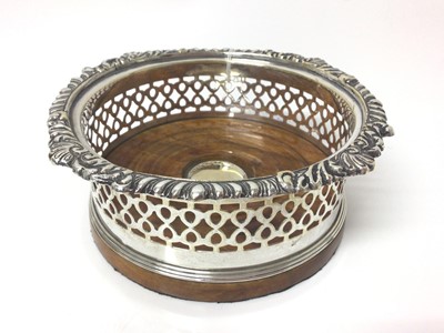 Lot 61 - Good quality antique silver plated coaster with gadrooned and pierced borders with turned wooden base
