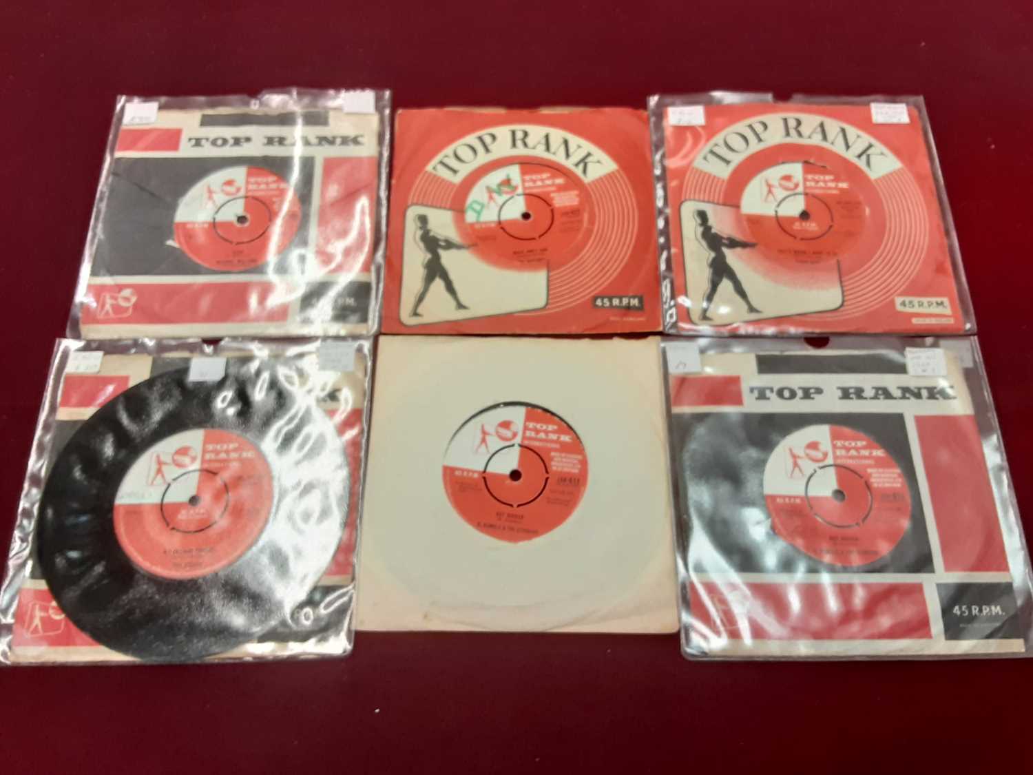 Lot 450 - Box of single records on the Top Rank label including Lee Allen, Jack Scott, Lorie Mann, Temptations, Annette, John Leyton, Adam Wade, Maurice Williams, Reivers, Vince Eager, Fireballs, Leaderbeats...