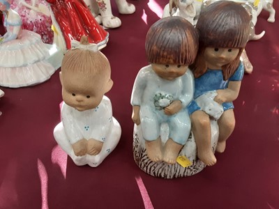 Lot 1184 - Lisa Larson ceramic figure of a baby, together with a similar group of two children possibly by the same artist (2)