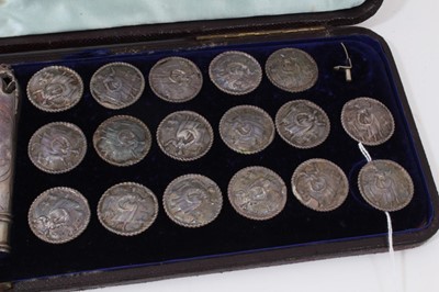 Lot 399 - Collection of thirty four Dutch white metal buttons and handle in fitted case