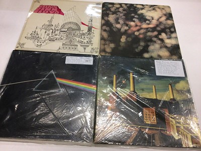 Lot 2252 - Eleven Pink Floyd LP's including Dark Side of the Moon, Animals, Meddle, Wish you were here and Relics. most of the vinyls are in Ex condition.