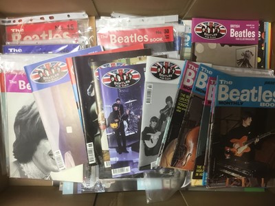 Lot 2259 - Beatles fan club magazines Issues 12-70 and Beatles Monthly Book 1963-1969 together with a box of Beatles and Merseabeat merchandise (2 boxes)