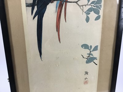 Lot 124 - Japanese woodblock by Ito Sozan (1884-1923)  - Red and Blue Macaws, circa 1925, published by Shozaburo Otanzaku Tat-e, 38cm x 17cm, in glazed frame