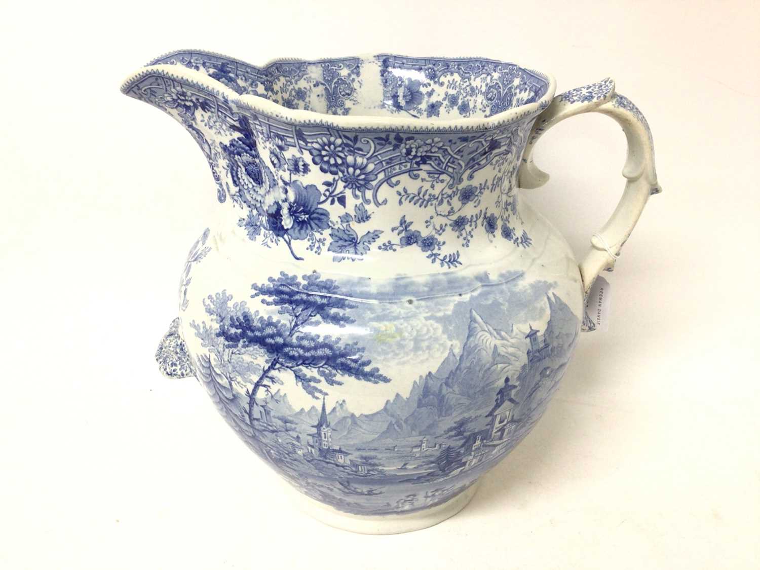 Lot 70 - Large Victorian blue and white wash jug decorated with tyrolean landscapes, 29cm high