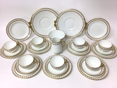 Lot 68 - Adderleys Ltd. porcelain teaset, Rouen pattern eleven place setting with two cake plates, milk jug and sugar bowl, each decorated with borders of fleur-de-lis (37 pieces)