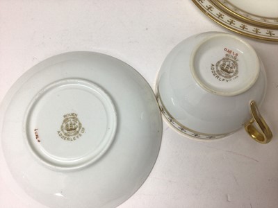 Lot 85 - Adderleys Ltd. porcelain teaset, Rouen pattern eleven place setting with two cake plates, milk jug and sugar bowl, each decorated with borders of fleur-de-lis (37 pieces)