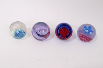 Lot 1220 - Nine Caithness Paperweights including reflections 93, 94, Pop Flowers, Red Carnation, Pastel, Petuna, Sands of time, Trapeze and Gentleheart (9)