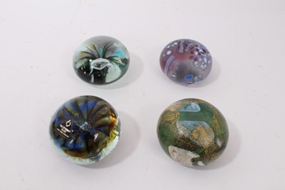Lot 1221 - Eight Isle of Wight Glass Paperweights including a large Flower paperweight by Michael Harris circa. 1976 (8)