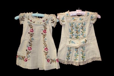 Lot 2151 - Two early 19th century child's hand embroidered cashmere wool dresses.