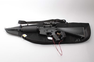 Lot 1083 - Air Soft Gun- Two battery powered air soft guns in slip cases (2)