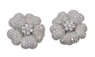 Lot 622 - Pair of diamond flower earrings