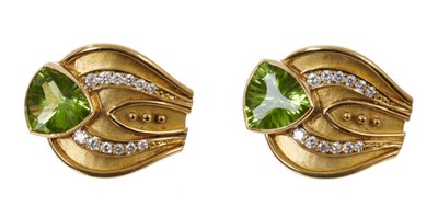 Lot 625 - Pair of peridot and diamond earrings