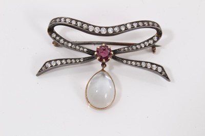 Lot 697 - Diamond, moonstone and ruby ribbon brooch