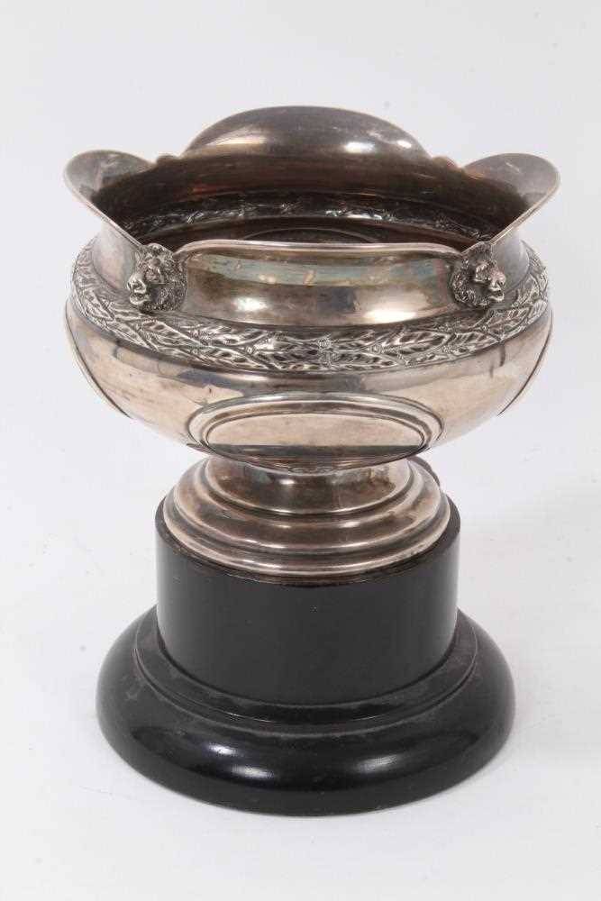 Lot 189 - Edwardian silver rosebowl with embossed band of laurel leaf decoration, on circular pedestal foot, Birmingham 1909, maker Thomas Edward Atkins, together with turned wood base